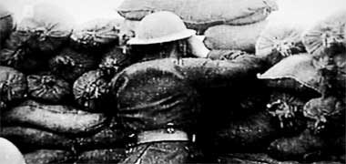 A British spotter looking out of a trench