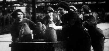 Women working with shells in a factory