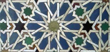 Detail of six-point geometric tilework at the Alcázar, Seville