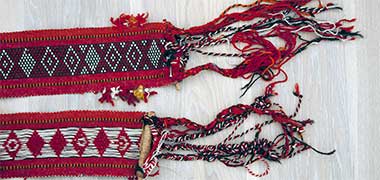 The ends of a decorative weaving
