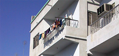 Washing drying on an apartment balcony in Doha