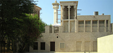 Old building with wind towers in the Bastakia, Dubai