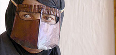 A Qatari woman wearing a batula 