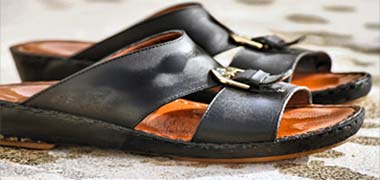A pair of black sandals