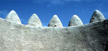 Shurfa on one of the circular towers at al Zubara