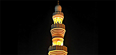 Al Mansuwra minaret by night