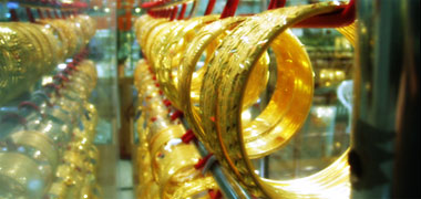 Bracelets hanging in a goldsmith's window