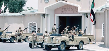 Security vehicles and personnel outside the gatehouse to the Guest Palace, August 1972