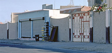 A pair of shops opened in the Intermediate Staff Housing Project, New District of Doha, 1985