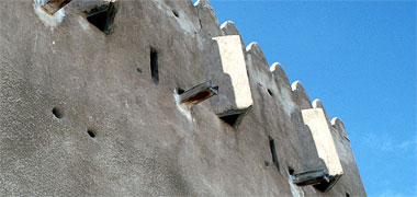 Machicolations on the square tower al-Zubara