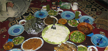 A meal laid out on a sufra