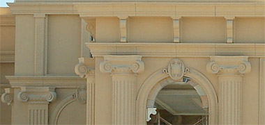 A corner detail from a classically styled building under construction