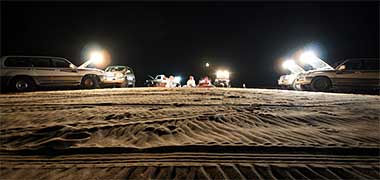 A group of Qataris enjoying the nighttime desert