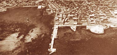 The main jetty at Doha showing adjacent reefs