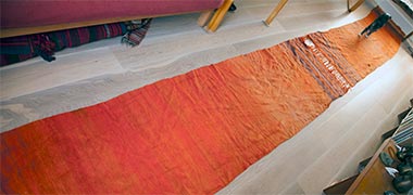 A runner woven as two joined pieces A runner woven as two joined pieces