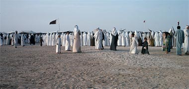Men preparing to dance at a razeef