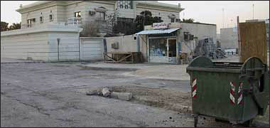 A Municipality refuse bin and other rubbish