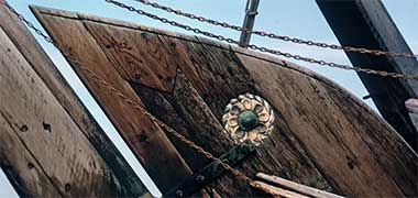 Carving on the stern timbers of a country craft