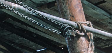 Detail of the steering chains leading to the aft deck of a country craft