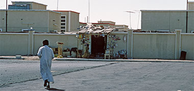 A retail outlet opened in a house wall in Madinat Khalifa, March 1972