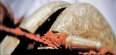 Part of a camel saddled, covered in silver – permission requested from the Qatar National Day website