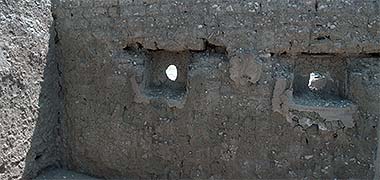 An internal mud wall in Umm Salal Muhammad