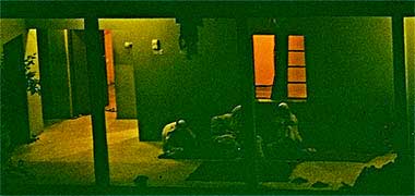 A family sits out on their verandah, 1972