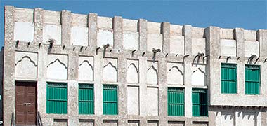 A building in Suq Waqf with the structure visually expressed