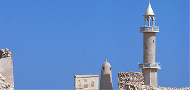 The minarets of an old and new mosque in Wakra, 1973
