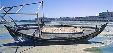 Dhows sitting in low water