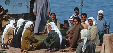 A boat crew sitting in an informal majlis