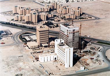 An aerial view of the Candilis intermediate staff housing project, seen over the first office buildings in the New District of Doha