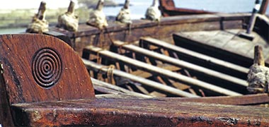 Concentric rings carved into the prow of a racing craft