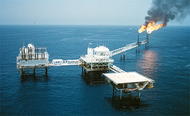 The Dana oil rig and flare – from a Ministry of Information photograph