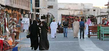 People moving in the redeveloped area of the old suq