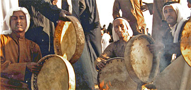 Drums being tuned for a razeef