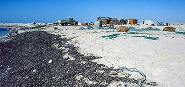 Fishermen camping by the shore near Umm Said