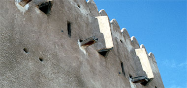 Machicolations on the square tower al-Zubara