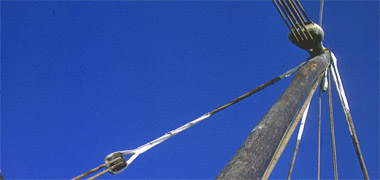 A multiple halyard block of sheaves seen from the deck