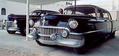 A 1950s Cadillac being polished at the Qatar National Museum, January 1978