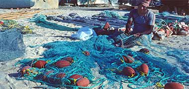 Mending fishing nets