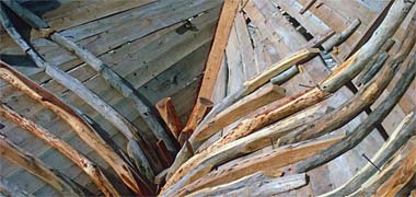 The traditional construction of craft using unplaned timber