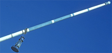The decorative flagpole at the rear of a country craft