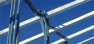 Timber spars above the stern quarters of a country craft