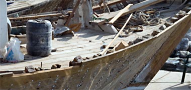 Work being carried out on the top rail of a boat