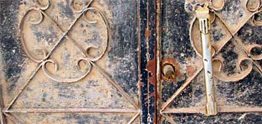 Detail of a rusting steel door