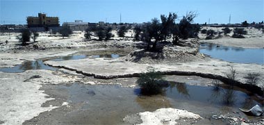 The empty reservoir at Umm Salal Muhammad looking east